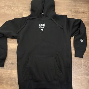 Black sweatshirt. Is a medium but could fit a large. Worn once.